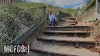 Curvy blonde isn't ashamed to get busted on the beach while fucking